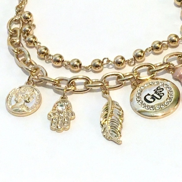 3/$29! GUESS charm necklace tassel, elephant, leaf - Picture 5 of 7